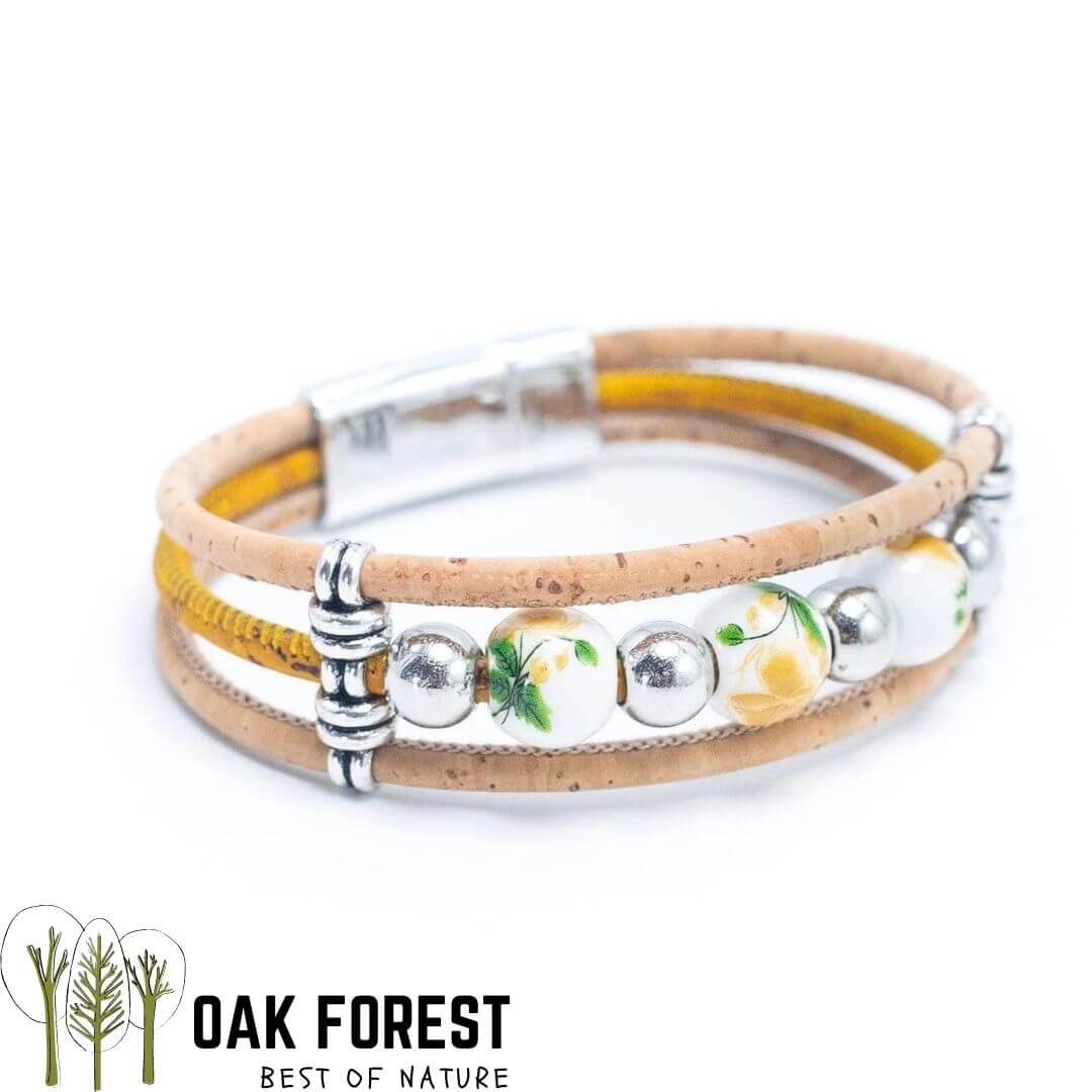 bracelet liege femme vegan - bracelet en liege - bracelet liège portugal - bracelet liège noir et or - bracelet femme noir or - bracelet en liège vegan - bracelet chic - bracelet fleurs femme - bracelet femme été - bracelet fantaisie - idée cadeau femme - anniversaire femme - bracelet coloré vegan - bracelet éthique - ecoresponsable
