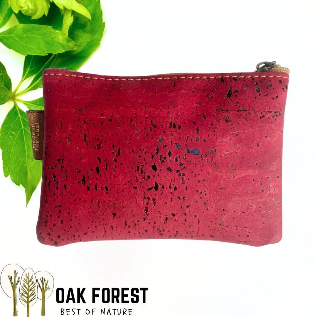 Porte-monnaie Terra Rosa en liège rouge framboise et liège marbré aux volutes roses et turquoise vue de face deux poches zippées