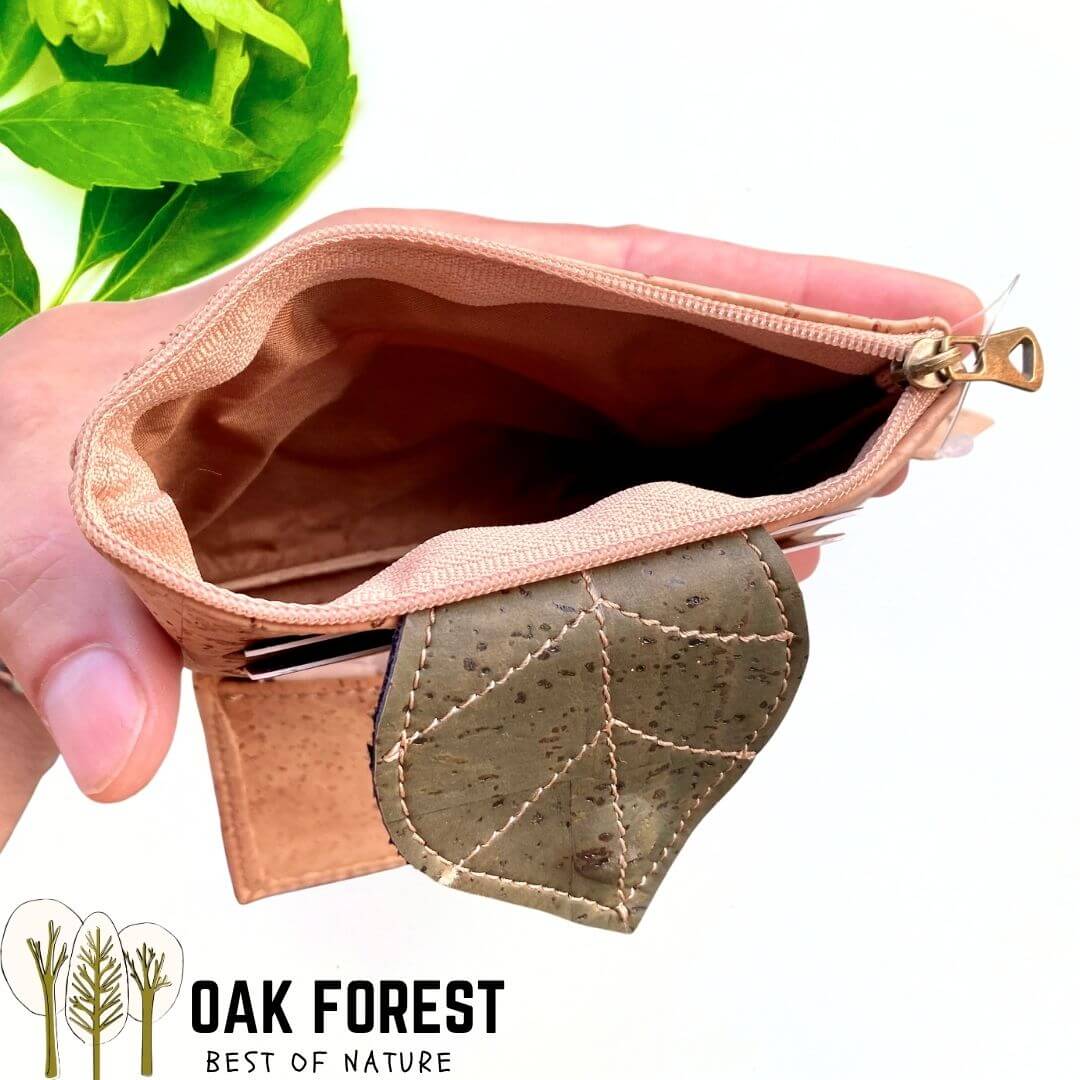 Intérieur du porte-monnaie Feuille ouvert montrant le compartiment zippé principal et la doublure textile