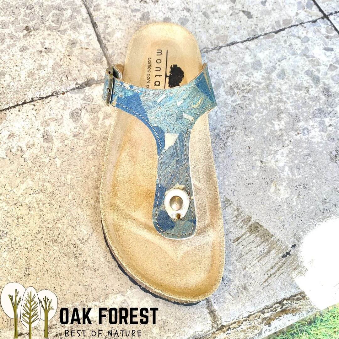 Vue de Face Birkenstock Oceano en liège bleu marbré avec semelle en liège et caoutchouc — vue de trois quarts